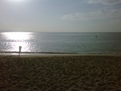 Peaceful sunset over water representing hope and healing